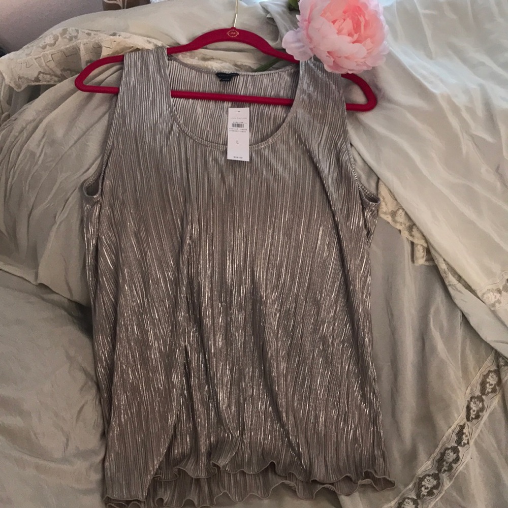 Brand New Shimmering Silver Color Pleaded Top